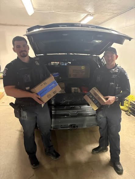 flat-rock-police-deliver-amazon-packages.png