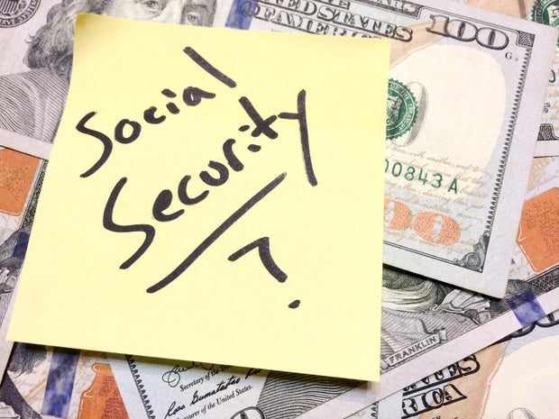 American cash money and yellow paper note Social Security with question mark