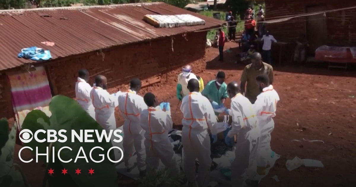 New travel restrictions go into effect Tuesday night to try to stop Ebola spread