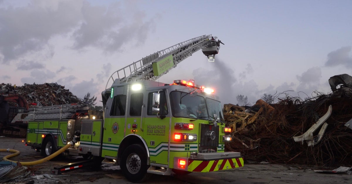 Opa-locka junkyard fire continues to smolder as business owners hope to rise from the ashes: "This is our entire life"