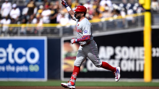 Kyle Schwarber rounds the bases after hitting a home run at Petco Park 