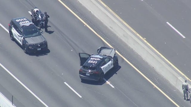 a patrol vehicle with front-end damage after a crash during a car chase 