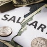 The inscription salary is torn in half. Concept on the financial crisis. There will be no salary 