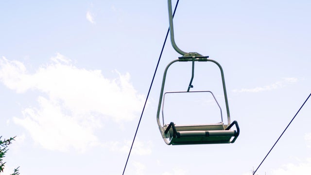 Scenic Mountain Chairlift with Panoramic Alpine Views 