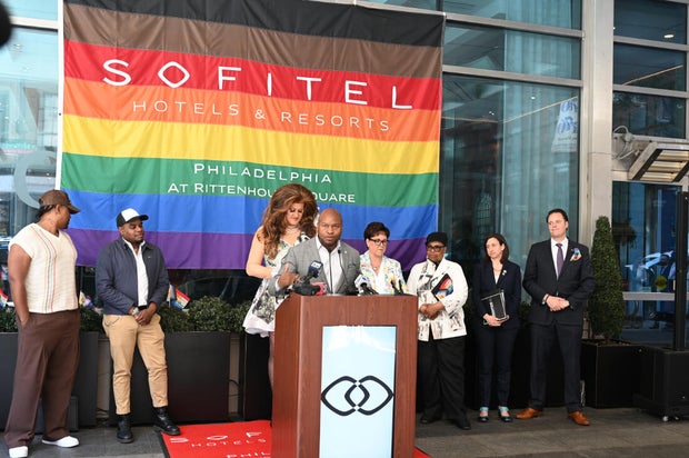 People post for photos at a Pride event at Sofitel Hotel in Philadelphia 
