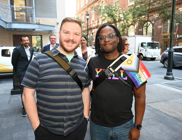 People post for photos at a Pride event at Sofitel Hotel in Philadelphia 