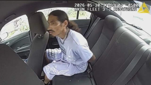 Suspect seized Dallas police car 
