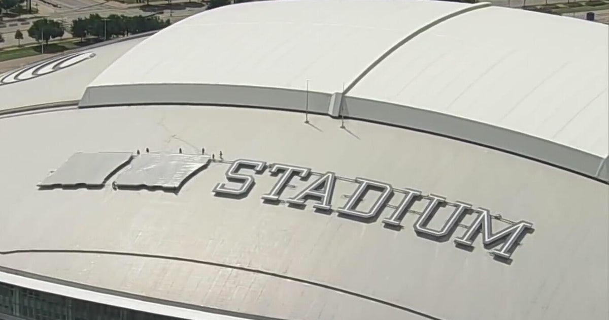 Crews cover up AT&T branding as stadium becomes "Dallas Stadium" for World Cup