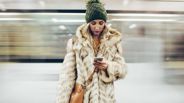 Portrait of a millenial girl staring at her phone 