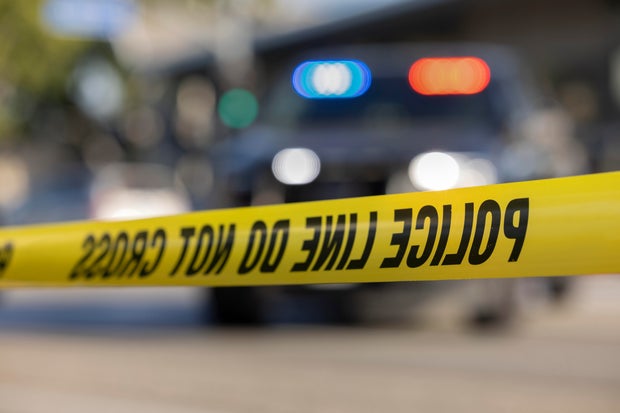 Police car and crime scene tape