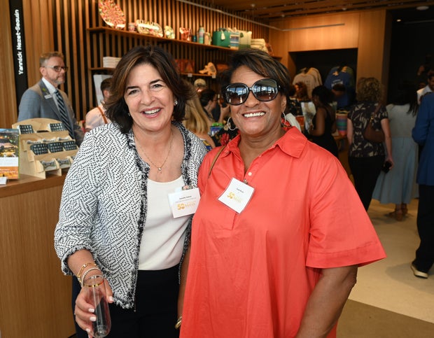 People celebrate the opening of the new Mann Center campus