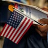 Candidates for U.S. citizenship wait to receive certificates of naturalization during a ceremony in New York on June 4, 2025. 