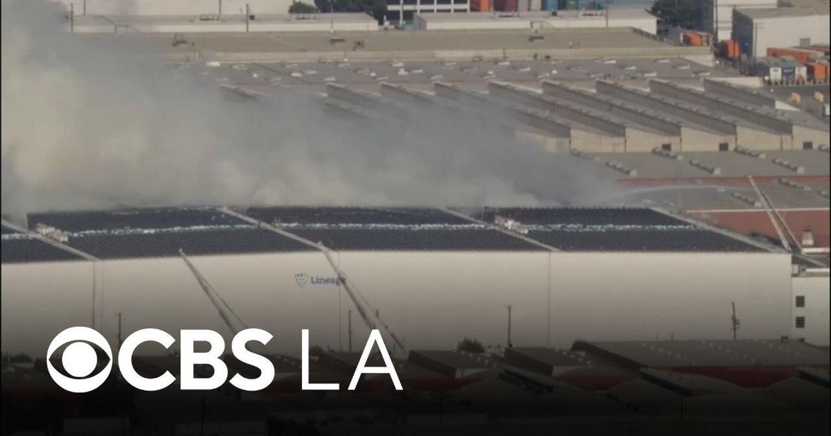 Boyle Heights fire continues to burn and spew smoke in Los Angeles