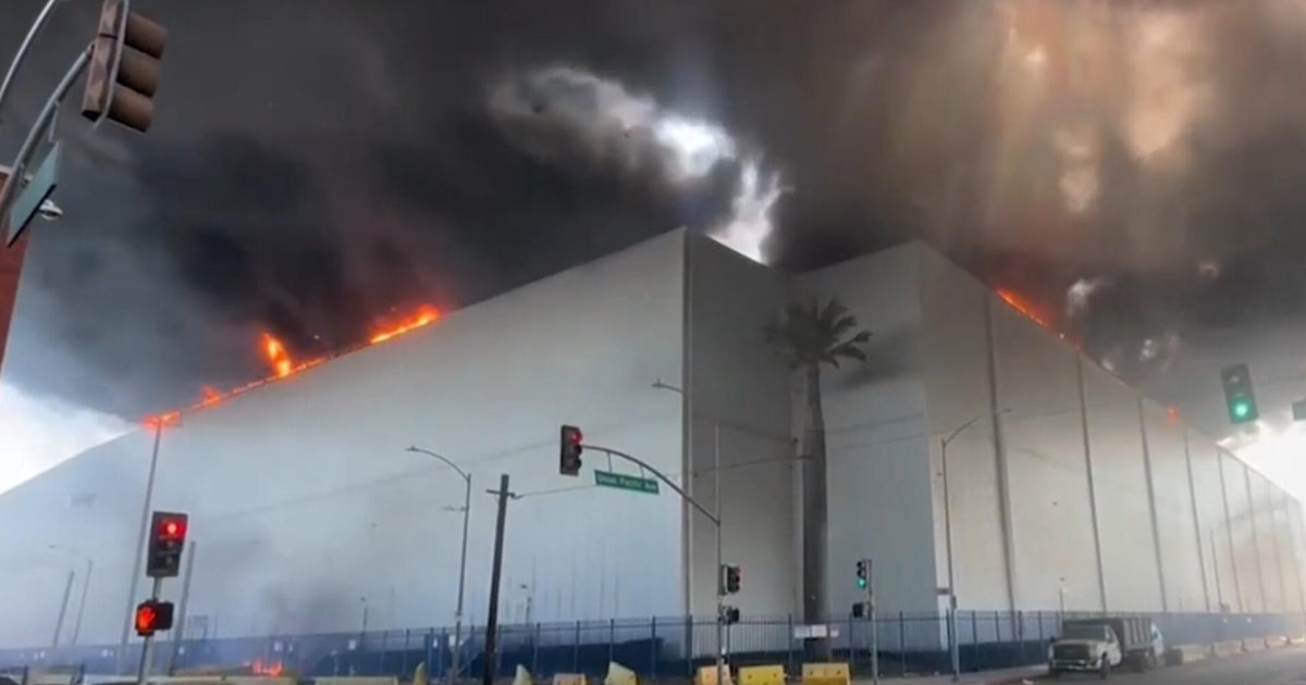 Massive warehouse fire in California is still blazing six days after inferno began