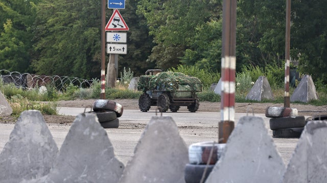 Ukrainian military vehicles travel through Donetsk region 