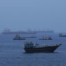 Commercial ships and oil tankers in Gulf of Oman ahead of Hormuz reopening 