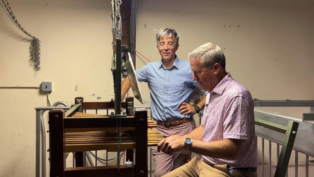 Reporter Joe Holden rings the bells using the carillon. 