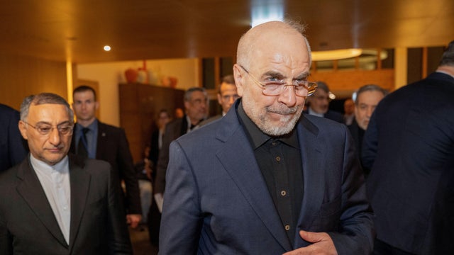 Mohammad Bagher Ghalibaf, right, arrives at the Burgenstock resort in Obburgen, Switzerland, June 21, 2026. 