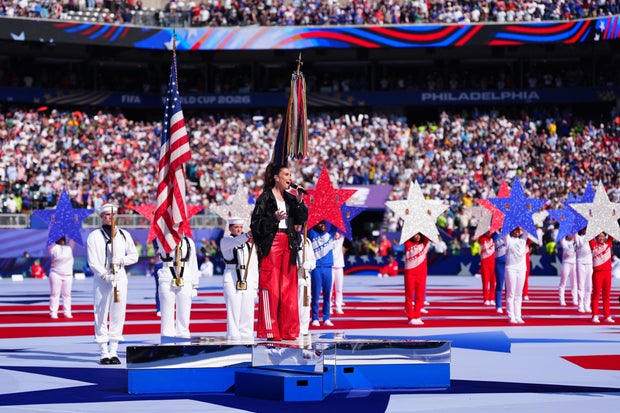 Idina Menzel sings the "Star-Spangled Banner", the United States' national anthem, before the World Cup round of 16 soccer match between Paraguay and France in Philadelphia