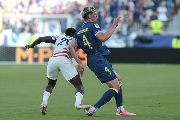 Folarin Balogun steps on Bosnia and Herzegovina defender Tarik Muharemovi's foot