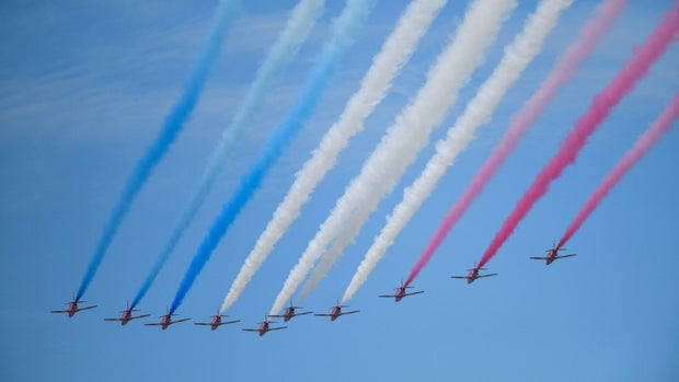 BOSTON, MA- AUGUST 16, 2019: The Royal Air Force Red Arrows North American Tour flies over the Boston Harbor. The tour aims to promote the best of British and deepen partnerships with close friends and allies through the UK's continuing commitment to e