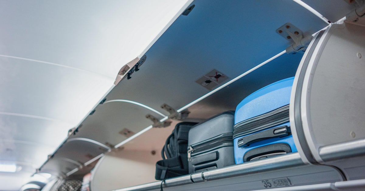 cbsnews.com - Jeff  Wagner - Why do airlines make passengers check their carry-on at the gate?
