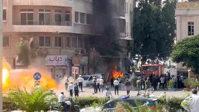 Explosive devices blow up near a hotel where French President Emmanuel Macron was meant to be staying, in Damascus 