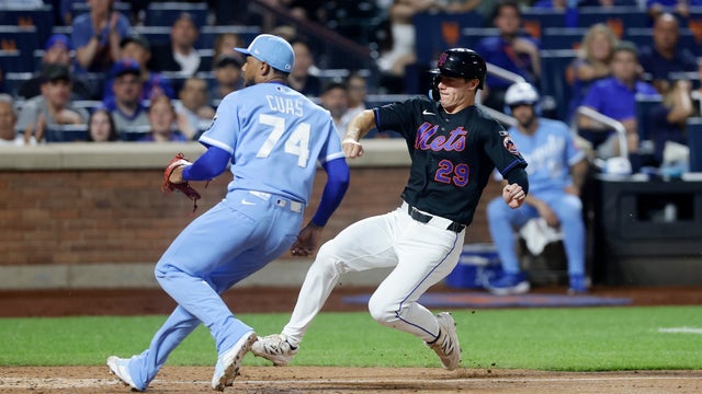Jared Young #29 of the New York Mets scores a run in the eighth inning after a wild pitch from Jose Cuas #74 of the Kansas City Royals at Citi Field on July 08, 2026 in New York City. 