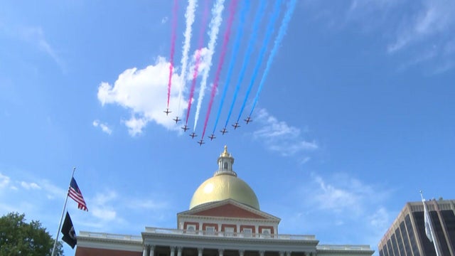 BOSTON, MA- AUGUST 16, 2019:   The Royal Air Force Red Arrows North American Tour flies  over the Boston Harbor. The tour aims to promote the best of British and deepen partnerships with close friends and allies through the UK's continuing commitment to e 