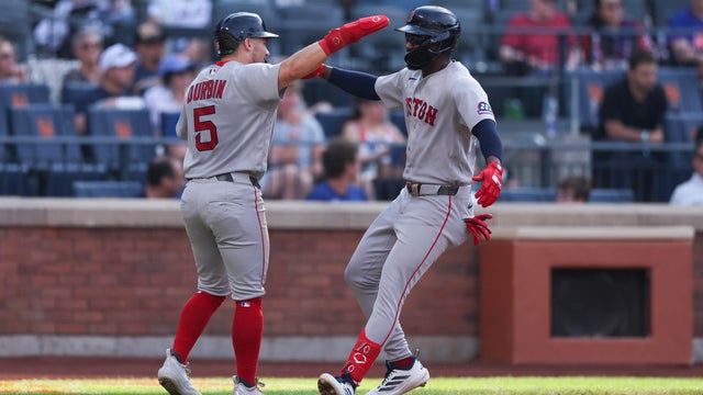 Andruw Monasterio #32 and Caleb Durbin #5 of the Boston Red Sox celebrate a 2-run home run during the fourth inning against the New York Mets at Citi Field on July 11, 2026 in the Queens borough of New York City. 
