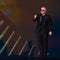 Pitbull sets record for largest gathering of people wearing bald caps