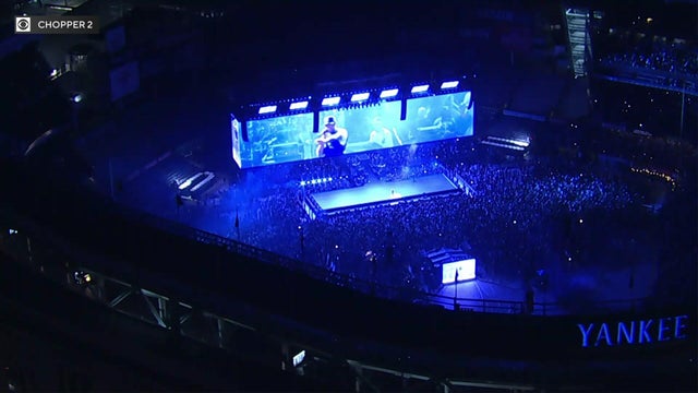 Aerial view of Jay-Z performing on stage at Yankee Stadium 