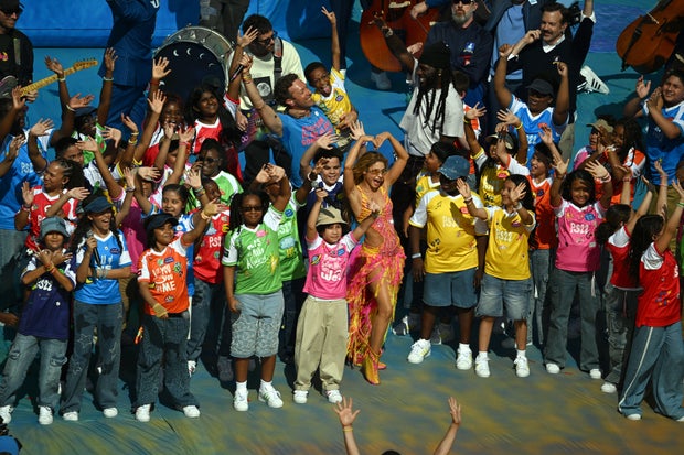 Shakira and PS22 Chorus during a half-time show during the FIFA World Cup 2026 Final match between Spain and Argentina at New York New Jersey Stadium on July 19, 2026 in East Rutherford, United States.