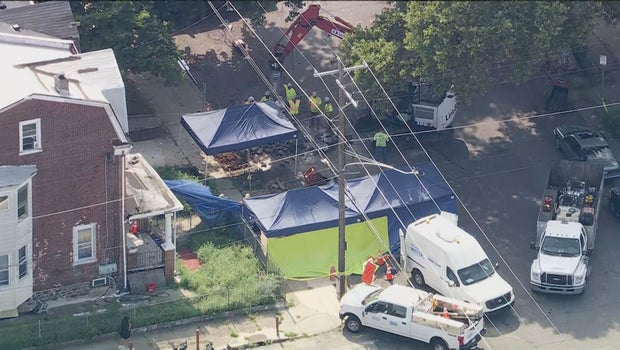 Police excavate pipes around house in Philadelphia's Olney neighborhood as investigation continues