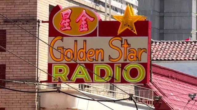 A neon sign was restored to recognize a Chinese-language radio program's legacy 