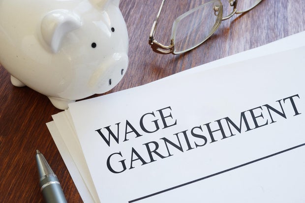 Wage Garnishment Concept Showing Court Ordered Payroll Deductions, Debt Collection Process, Employee Income Withholding, Financial Obligations, Legal Enforcement and Personal Finance Challenges