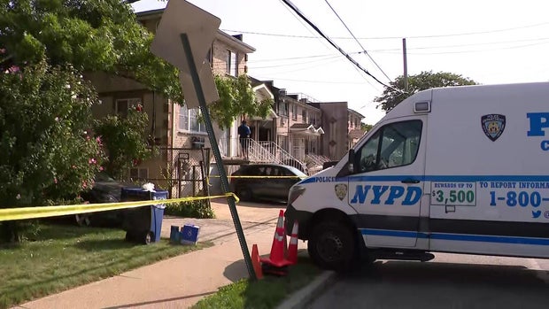 Home behind crime scene tape