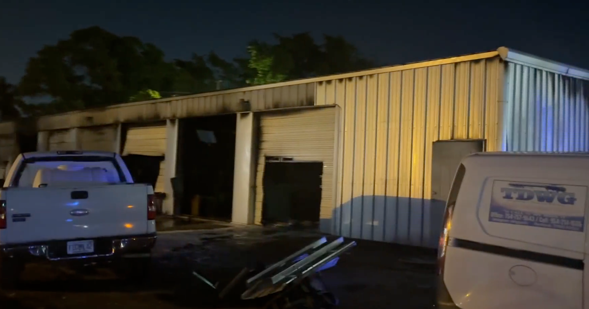 Pompano Beach warehouse fire contained after burning building near homes; no injuries reported
