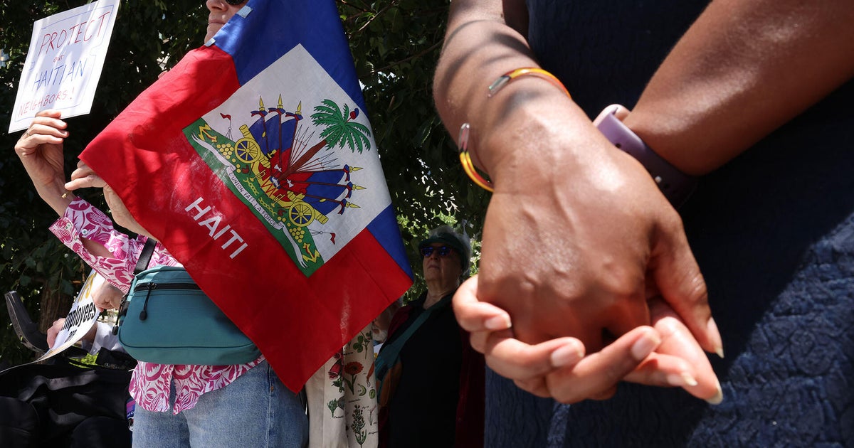 cbsnews.com - Louisa  Moller - Protected status ends for thousands of Haitians in Massachusetts: 'This is going to be a nightmare'