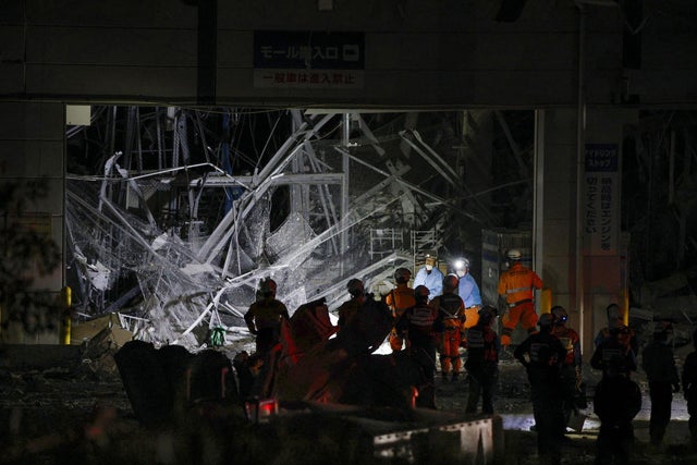 Rescue teams continue search for survivors in Japan's Kumamoto prefecture after earthquake leaves at least 13 dead; nearly 37,000 homes without power.