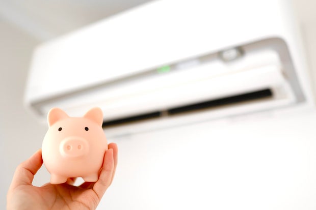 an air conditioner and a piggy bank. 