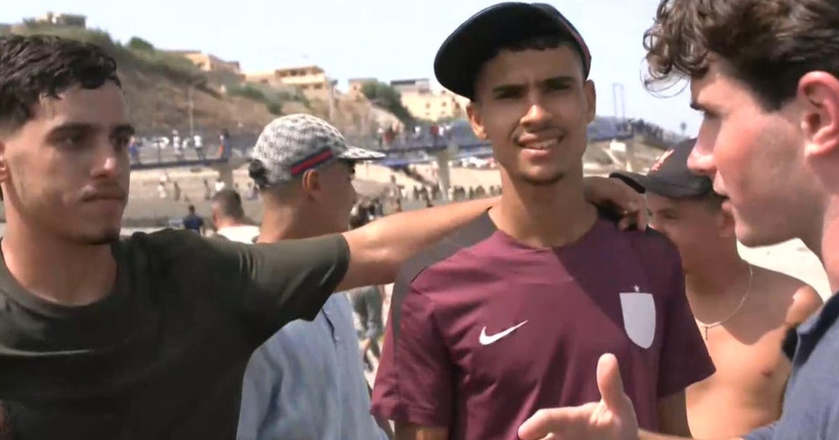 Why did a wave of migrants cross from Morocco into Spain's Ceuta territory?