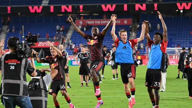 New York Red Bulls players including Matthew Dos Santos #56, Mijahir Jim&eacute;nez #91, Nate Worth #80, and Roald Mitchell #33 celebrate after playing Orlando City SC at Sports Illustrated Stadium on August 01, 2026 in Harrison, New Jersey. 