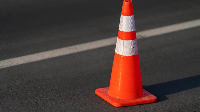 Traffic cone,an image of cautions on asphalt road 
