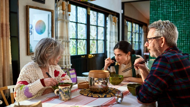 Family enjoying meal together in kitchen 