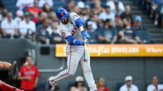 Luis Torrens #13 of the New York Mets hits an RBI single during the fourth inning against the Cleveland Guardians at Progressive Field on August 04, 2026 in Cleveland, Ohio. 