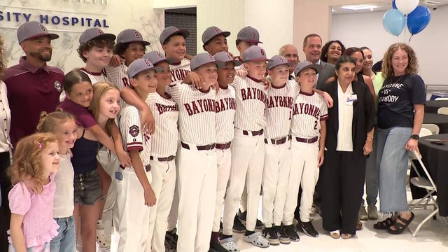 Bayonne 12U Little League team at party 