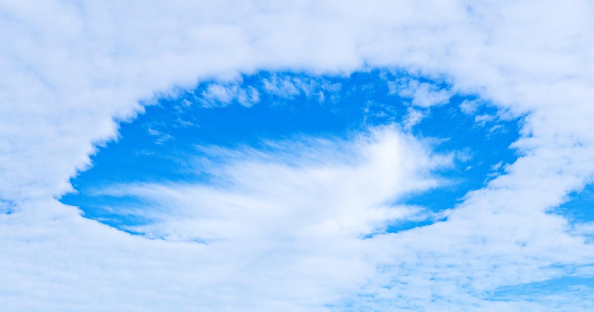 Hole punch clouds in the sky