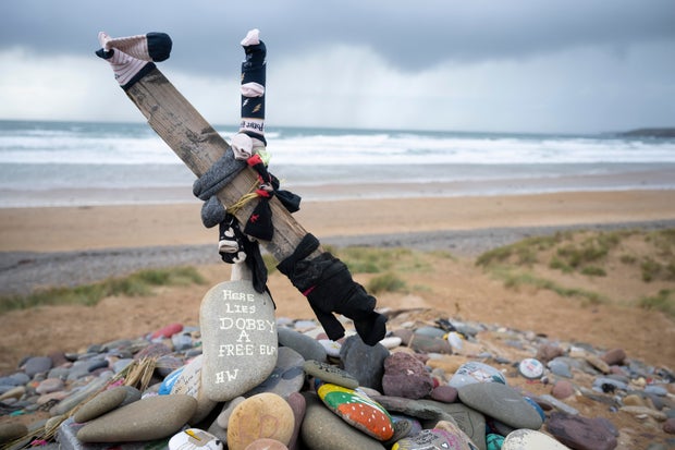 "Harry Potter" fans divert undersea power cable to avoid Dobby's memorial in Wales 2 Socks No Longer Welcome At Literary House Elf's Grave