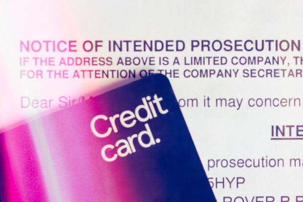 Legal notice document of intended prosecution for credit card debt addressed to company secretary in office setting 